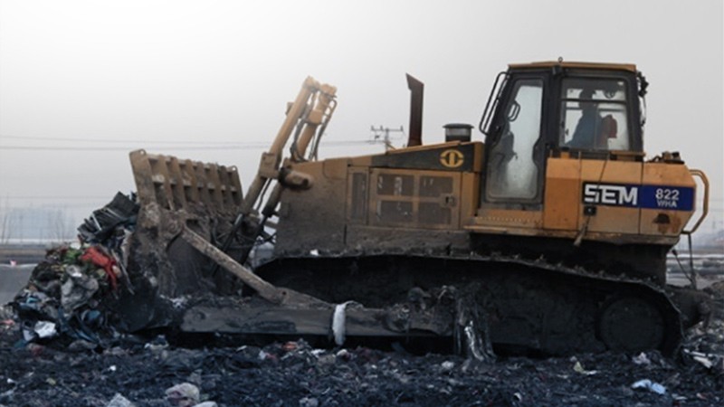 SEM machine working in waste